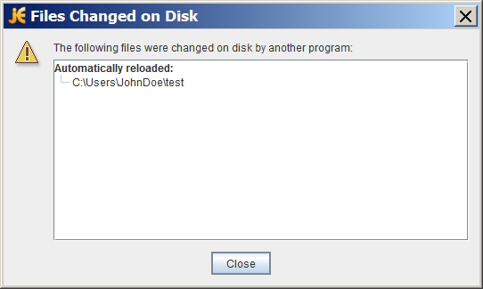 示例 jEdit 对话框说明：另一个程序在磁盘上更改了以下文件。